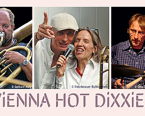 Mitglieder der Vienna Hot Dixies Band beim Spielen von Blechblasinstrumenten, Gesang und Schlagzeug